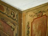 a marble top cabinet with a marble top on it