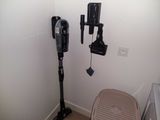 two parking meters in the corner of a room