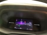 a digital display in the center of a car