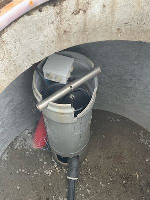 a bucket that is sitting in the middle of a hole
