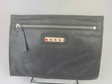 a black leather clutch bag with a zipper on the front
