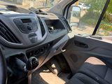 a view of the inside of a van from the driver ' s seat