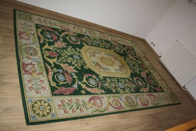 a large rug on the floor in a room