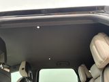 a view of the inside of a vehicle with the door open