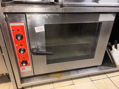 an image of a stainless steel oven with a door open