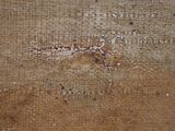 a close up of a piece of cloth with writing on it