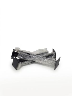 a black and white photo of a pair of scissors