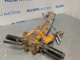 a picture of an old machine that is sitting on the floor