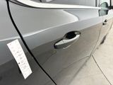 a sticker on the door of a car with a sticker on it