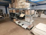 many boxes and boxes on the shelves in the warehouse