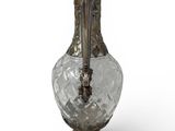 a glass vase that is sitting on a table