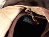 a close up of a brown bag with a label on it