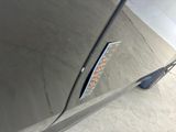 a close up of a car door with a sticker on it