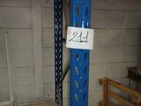 a picture of a blue rack with a sign on it