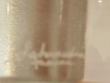 a close up of a glass of water on a table
