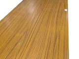 a close up of a wooden table with a white background