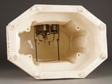 a picture of a white box with a clock inside of it