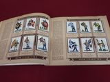 an open book with pictures of different characters on it
