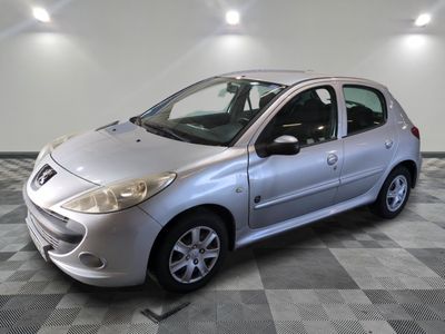 a picture of a silver car parked in a garage