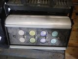 an image of a stove with a bunch of buttons on it