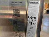 a stainless steel refrigerator that has a sticker on it