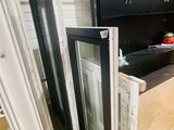 a kitchen with a refrigerator, microwave and a refrigerator freezer in it