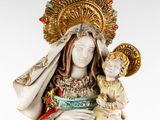 an image of a statue of a woman holding a child
