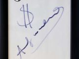 framed photograph of a drawing of a dollar sign on a piece of paper