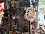a room with a lot of items on the shelves