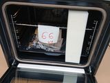 a white oven with a sign on it that says 60