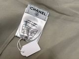 the label on a chanel jacket is attached to the back of the jacket
