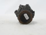 a metal object with a tag on it on a white surface