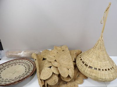 some baskets and a bowl of chips on a table