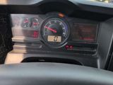 a close up of a car dashboard with a speedometer