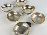 six silverplated teapots with lids and handles