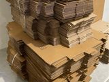 a pile of cardboard sitting on top of a table