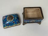 a small box with a lid and a small box with a lid