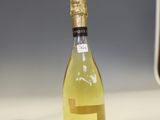a bottle of wine that is sitting on a counter