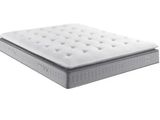 the mattress is white and has a white cover on it