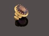 an amethorate and gold ring