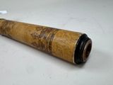 an old telescope is laying on a table with a white background