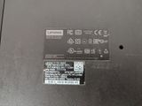 a close up of the back of a laptop with a sticker on it