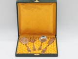a box with a set of silverware in it