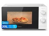a white microwave with a plate of pizza inside of it
