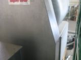 a machine that is sitting next to a box