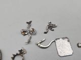 a lot of silver items that are on a table
