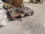 a pile of bags of stuff sitting on the floor