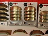 many different types of door handles and knobs on the table