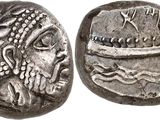 a silver coin with an image of a boat on it