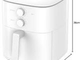 an image of a white air fryer sitting on top of a counter